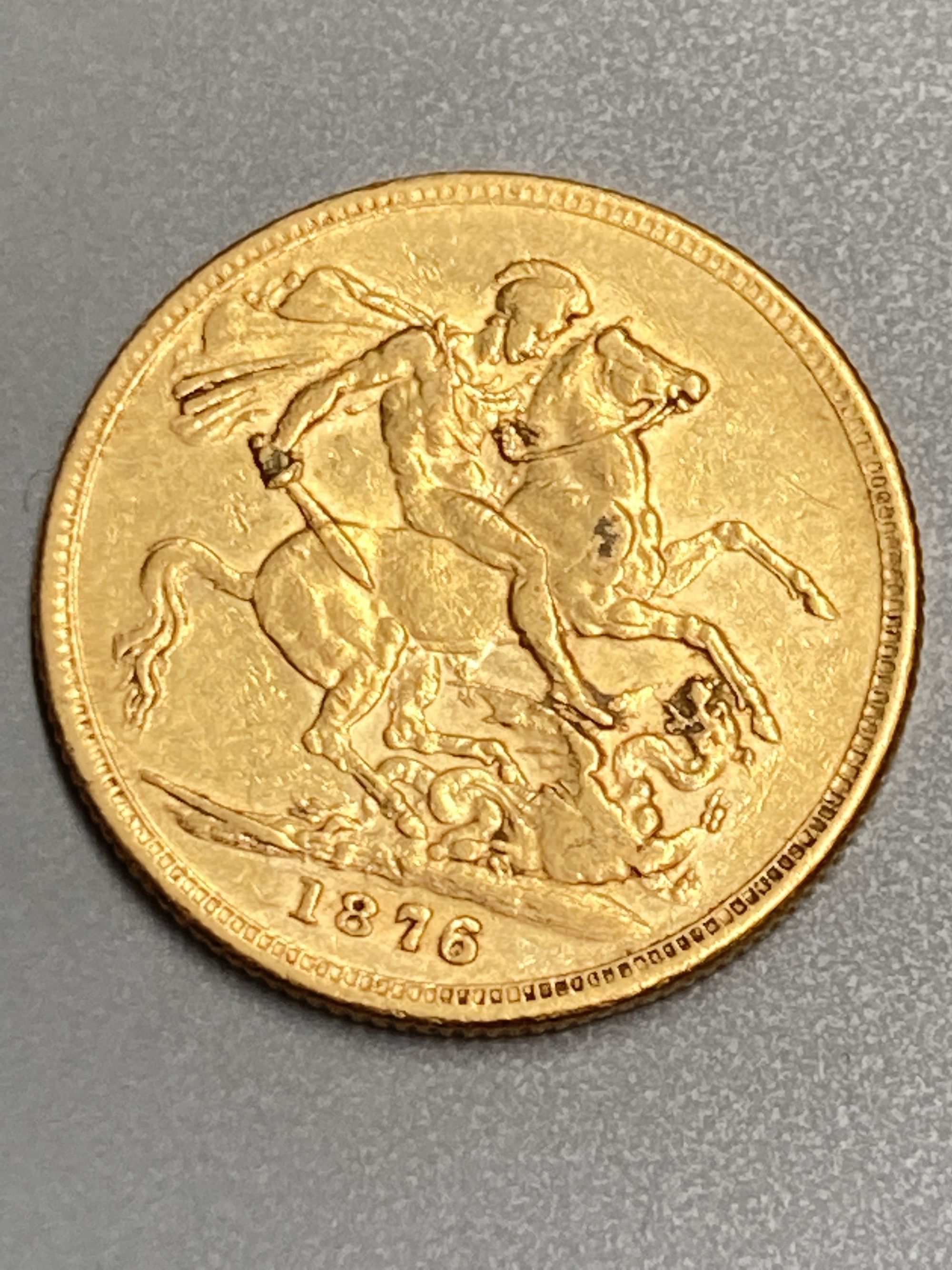 A Victoria 1876M gold sovereign, AVF.